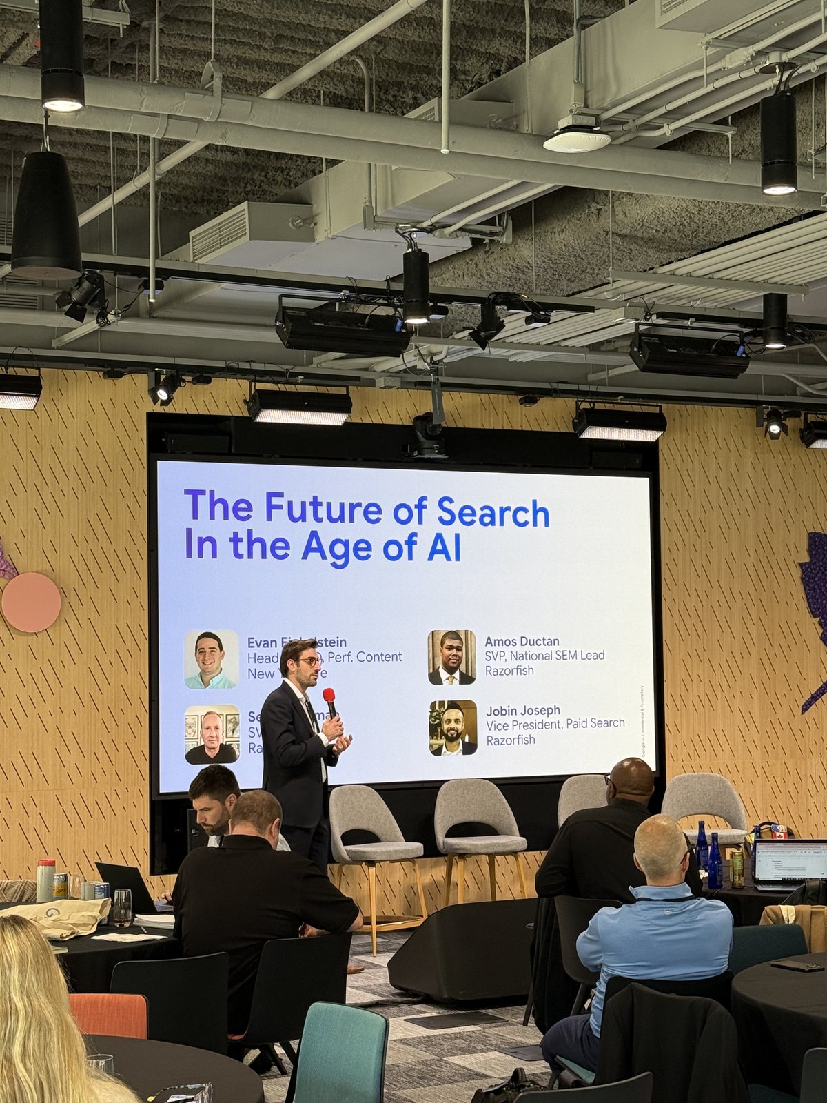 Amos Ductan presenting 'The Future of Search in the Age of AI' on stage